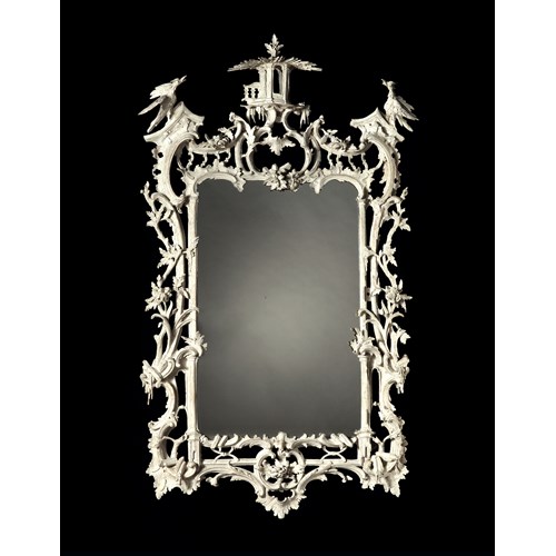 A rare Chippendale period carved and painted mirror. Retaining its original white painted decoration